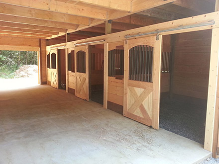 Interior of barn with stables.